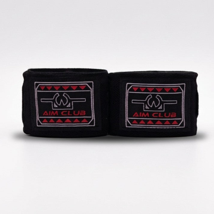 Pair of black boxing hand wraps with Aim Club logo on a white background